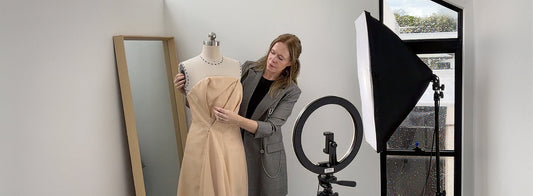 pattern-making-teacher-draping-dress-on-dress-form